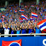 **Image Prompt:** A packed soccer stadium in Slovakia, fans cheering enthusiastically, Slovakian flag waving.  Focus on the crowd's energy and passion.  Fully clothed, appropriate attire, safe for work, professional photography, natural proportions, dynamic composition, family-friendly.